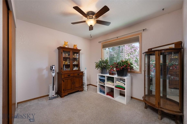 115 8th, Belgrade, MT 59714 - home office with a ceiling fan, light colored carpet, and baseboards
