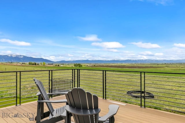 200 Miller Point Pl, Belgrade, MT 59714 - wooden deck featuring a view of rural / pastoral area and a mountain view