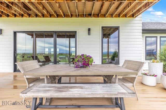 200 Miller Point Pl, Belgrade, MT 59714 - wooden deck with outdoor dining area