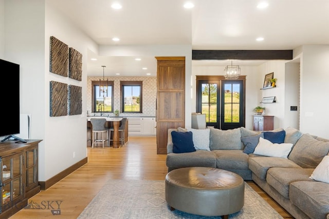 200 Miller Point Pl, Belgrade, MT 59714 - living area with recessed lighting, plenty of natural light, light wood-style floors, and baseboards