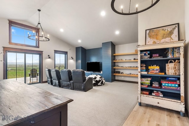 200 Miller Point Pl, Belgrade, MT 59714 - living room featuring a chandelier, high vaulted ceiling, recessed lighting, and light wood-style floors