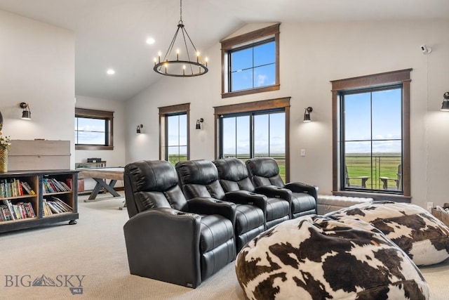 200 Miller Point Pl, Belgrade, MT 59714 - living room featuring carpet flooring, a chandelier, recessed lighting, and high vaulted ceiling