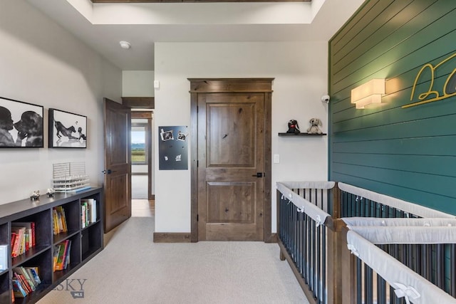 200 Miller Point Pl, Belgrade, MT 59714 - corridor featuring carpet floors and wooden walls