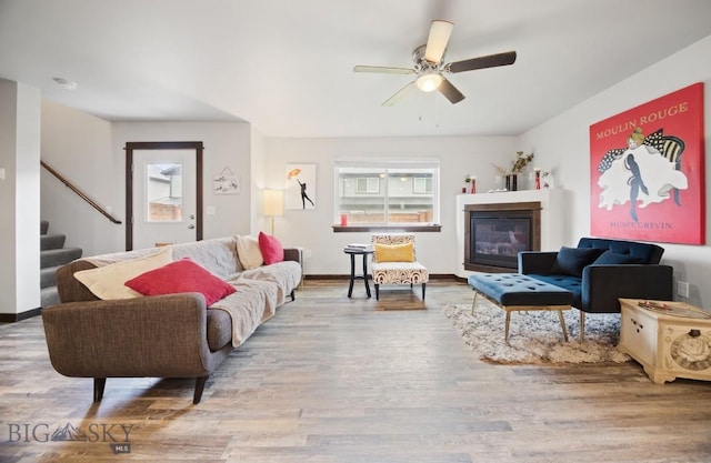 705 Halfpipe St Unit B, Belgrade, MT 59714 - living area with stairs, a ceiling fan, and wood finished floors
