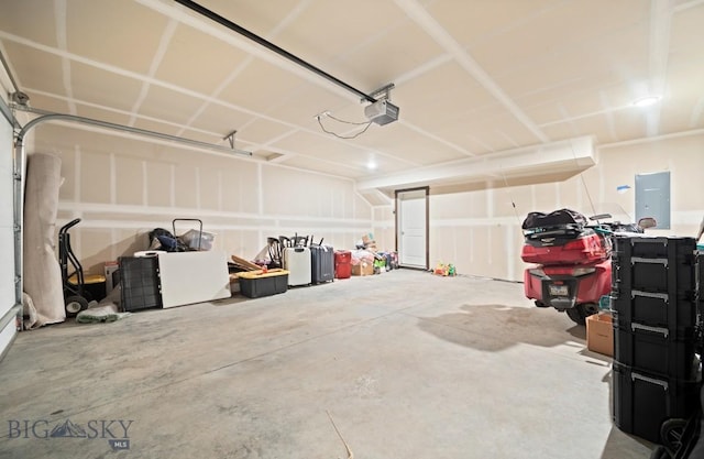 705 Halfpipe St Unit B, Belgrade, MT 59714 - garage with a garage door opener and electric panel