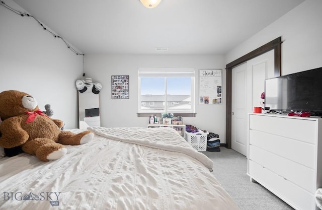 705 Halfpipe St Unit B, Belgrade, MT 59714 - bedroom featuring light colored carpet