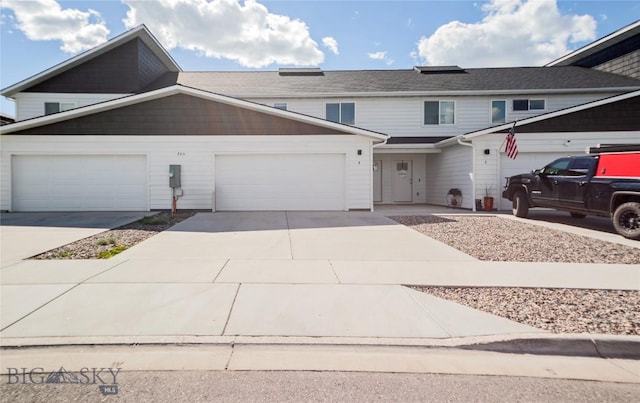 705 Halfpipe St Unit B, Belgrade, MT 59714 - view of front of house with concrete driveway and an attached garage