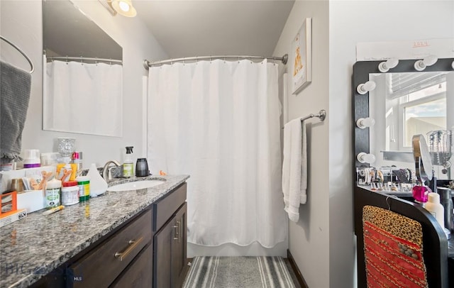 705 Halfpipe St Unit B, Belgrade, MT 59714 - bathroom with vanity and a shower with curtain