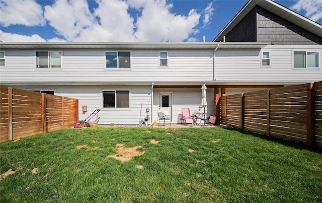 705 Halfpipe St Unit B, Belgrade, MT 59714 - back of property with a patio area
