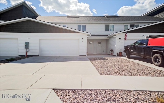 705 Halfpipe St Unit B, Belgrade, MT 59714 - view of front of property featuring driveway and an attached garage