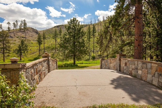 101 W Bridger Creek Rd, Big Timber, MT 59011 - view of patio / terrace featuring a mountain view and a wooded view