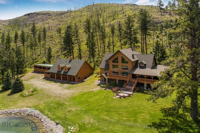 101 W Bridger Creek Rd, Big Timber, MT 59011 - aerial view of property and surrounding area with a mountainous background and a heavily wooded area