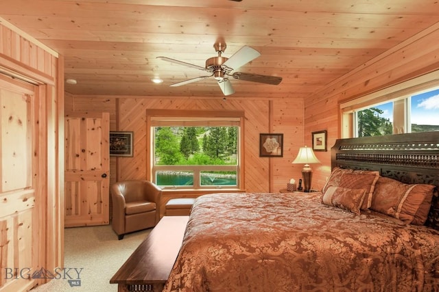 101 W Bridger Creek Rd, Big Timber, MT 59011 - bedroom featuring multiple windows, wood ceiling, carpet, and wooden walls