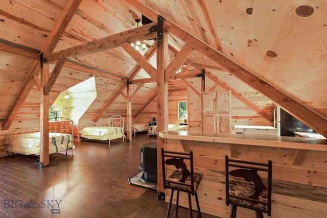 101 W Bridger Creek Rd, Big Timber, MT 59011 - bedroom featuring lofted ceiling, dark wood finished floors, wooden ceiling, and wood walls