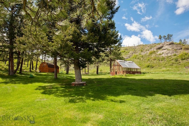 101 W Bridger Creek Rd, Big Timber, MT 59011 - view of grassy yard with an outbuilding