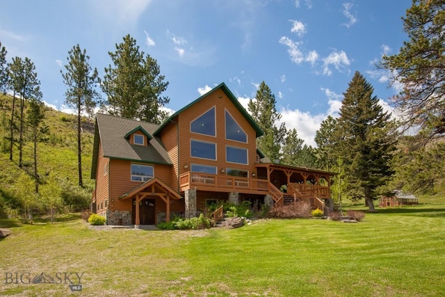 101 W Bridger Creek Rd, Big Timber, MT 59011 - rear view of property with stone siding, stairs, a yard, and a deck