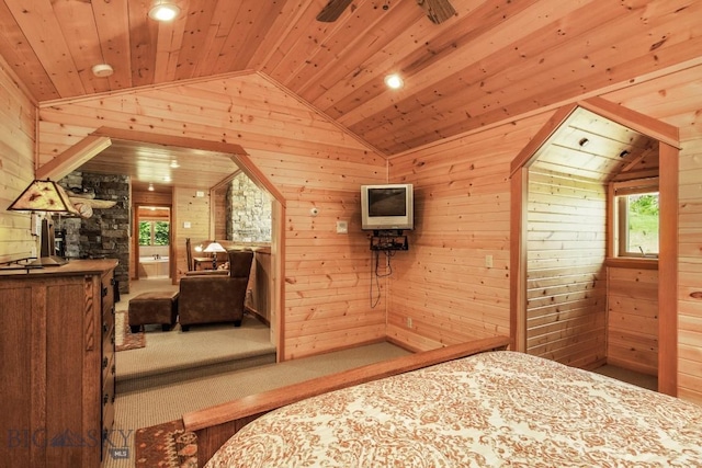 101 W Bridger Creek Rd, Big Timber, MT 59011 - bedroom with vaulted ceiling, wood walls, carpet, wooden ceiling, and multiple windows