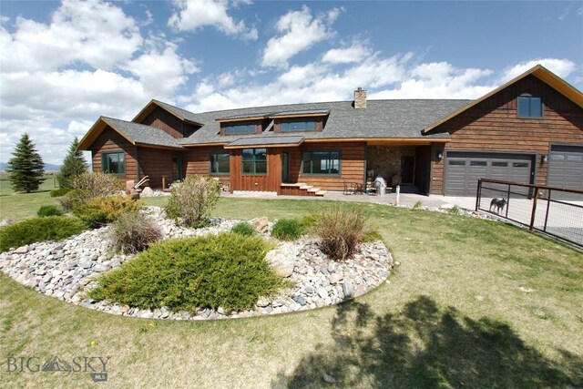 7 N Lewis And Clark Trl, Whitehall, MT 59759 - log home featuring a chimney and a garage
