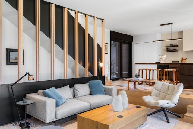 living room featuring light wood-style floors