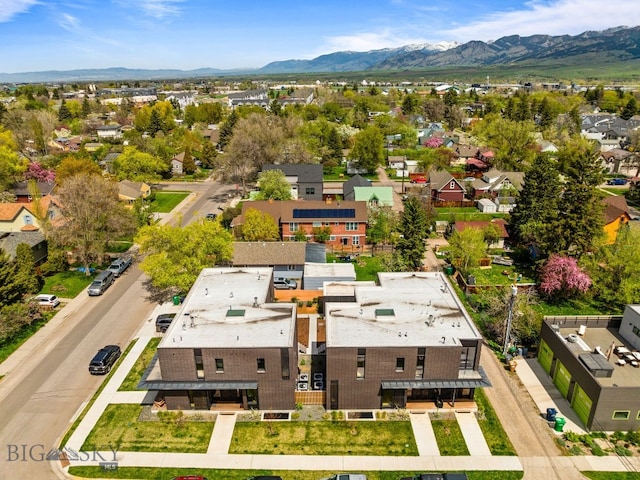 aerial perspective of suburban area featuring a mountain backdrop