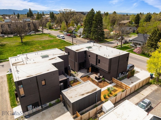 aerial view of residential area with a mountainous background