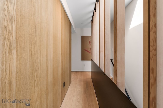 hall with wood finished floors