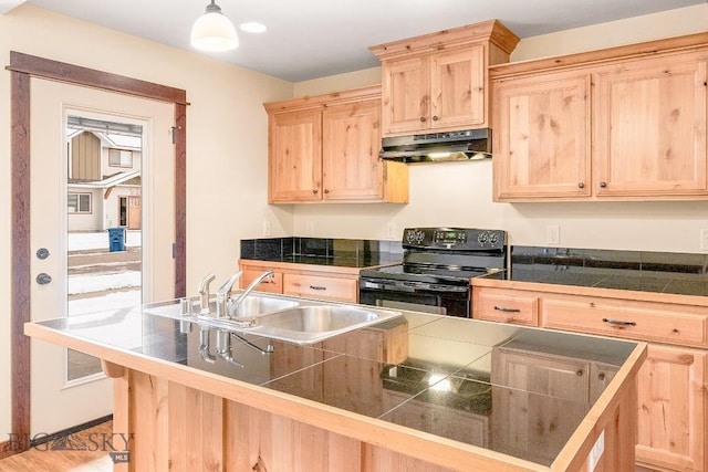 kitchen with black range with electric stovetop, light brown cabinets, under cabinet range hood, a sink, and tile counters