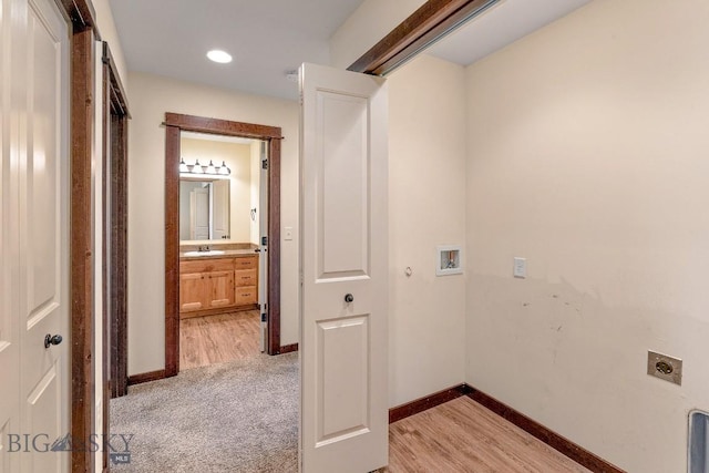 laundry area with electric dryer hookup, hookup for a washing machine, baseboards, light carpet, and recessed lighting