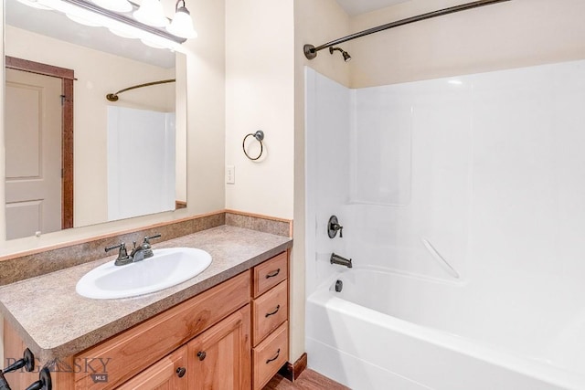full bathroom with tub / shower combination and vanity
