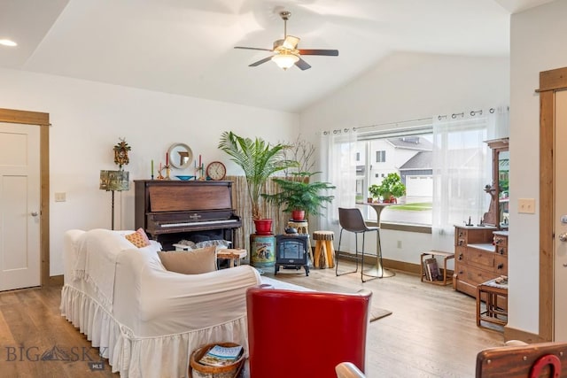 182 Snowy Owl Trl, Bozeman, MT 59718 - living room with lofted ceiling, ceiling fan, wood finished floors, and baseboards