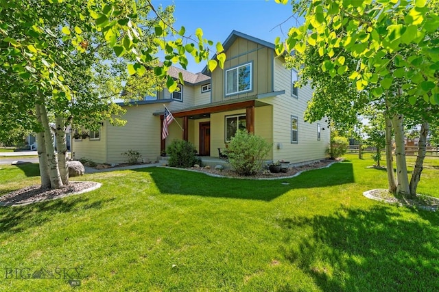 508 Coral Dr, Belgrade, MT 59714 - craftsman-style house featuring a front yard and board and batten siding