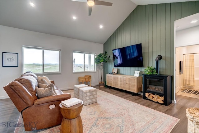 36 Sante Fe, Three Forks, MT 59752 - living area featuring a ceiling fan, wood finished floors, baseboards, an accent wall, and recessed lighting