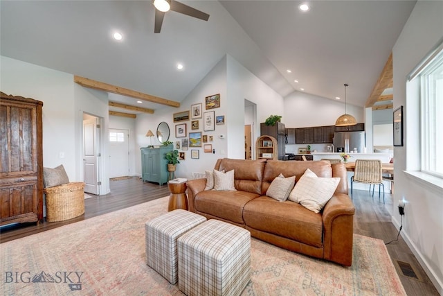 36 Sante Fe, Three Forks, MT 59752 - living area featuring lofted ceiling, wood finished floors, a ceiling fan, recessed lighting, and baseboards