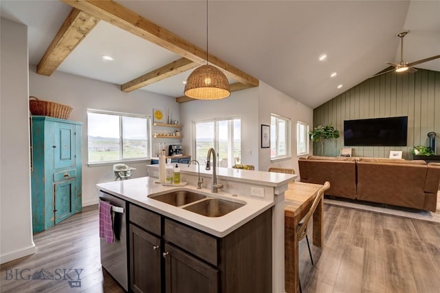 36 Sante Fe, Three Forks, MT 59752 - kitchen with a sink, dishwasher, wood finished floors, light countertops, and hanging light fixtures
