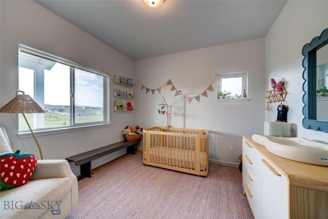36 Sante Fe, Three Forks, MT 59752 - bedroom with light colored carpet, a sink, and baseboards