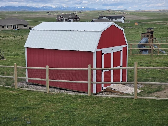 36 Sante Fe, Three Forks, MT 59752 - view of barn featuring a rural view and a mountain view