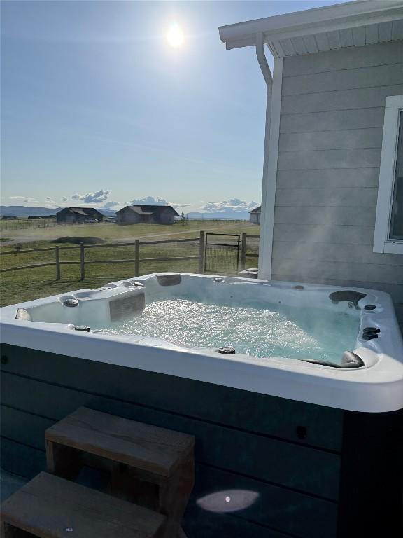 36 Sante Fe, Three Forks, MT 59752 - view of patio / terrace featuring a hot tub