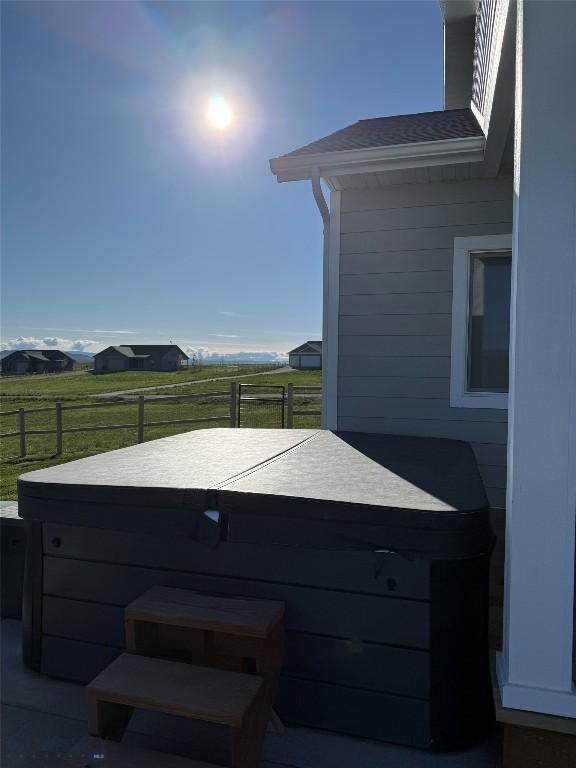 36 Sante Fe, Three Forks, MT 59752 - view of patio / terrace with a hot tub