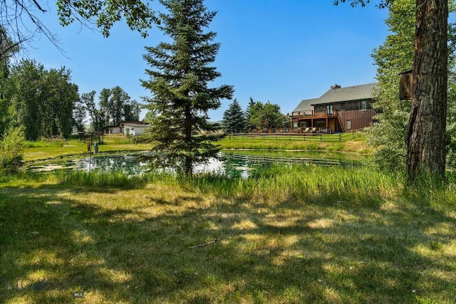 9704 River Rd, Bozeman, MT 59718 - view of grassy yard with a wooden deck