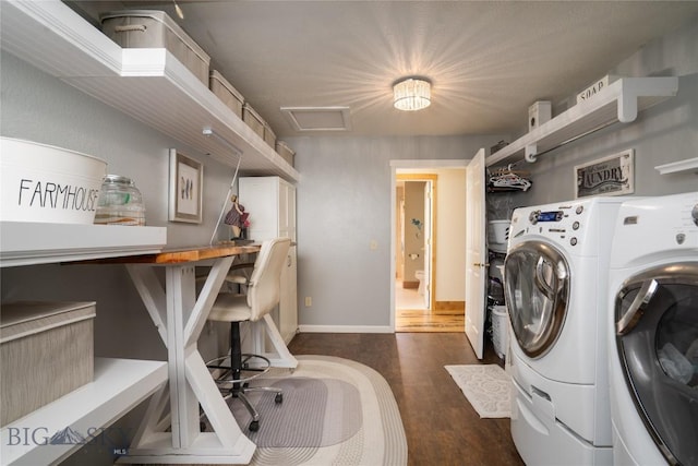 9704 River Rd, Bozeman, MT 59718 - clothes washing area featuring washing machine and clothes dryer, dark wood-type flooring, a desk, attic access, and baseboards