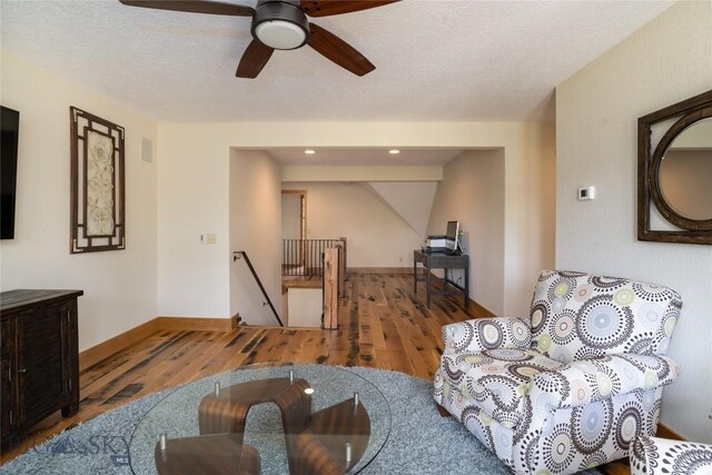 9704 River Rd, Bozeman, MT 59718 - living room with wood finished floors, ceiling fan, and baseboards