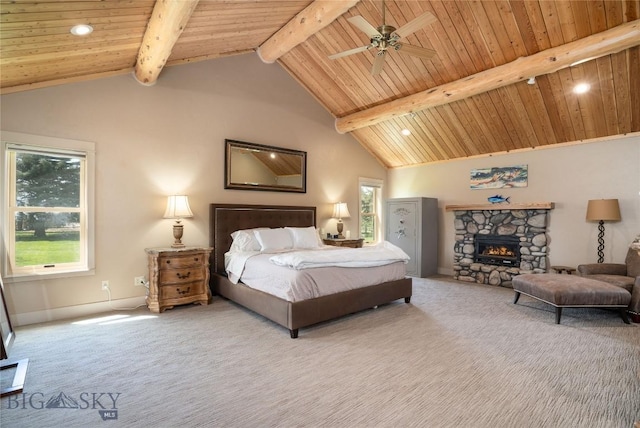 9704 River Rd, Bozeman, MT 59718 - bedroom with carpet, wooden ceiling, beamed ceiling, a fireplace, and recessed lighting