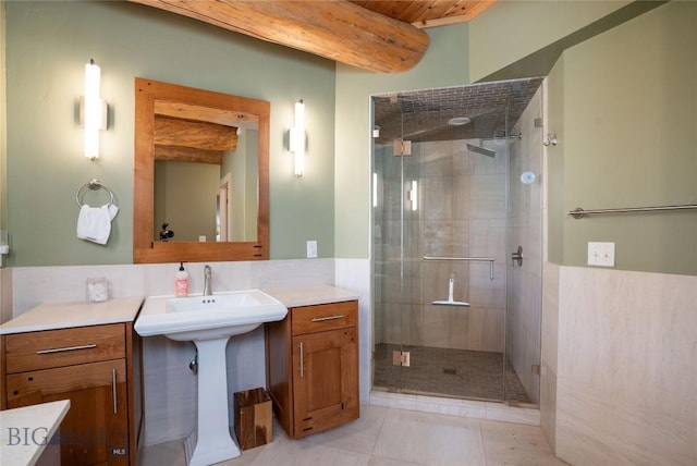 9704 River Rd, Bozeman, MT 59718 - bathroom featuring beam ceiling and a stall shower