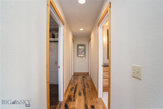 9704 River Rd, Bozeman, MT 59718 - corridor with light wood-style floors, recessed lighting, and baseboards