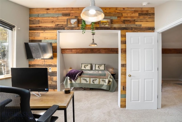 9704 River Rd, Bozeman, MT 59718 - bedroom with wooden walls, carpet flooring, and a desk