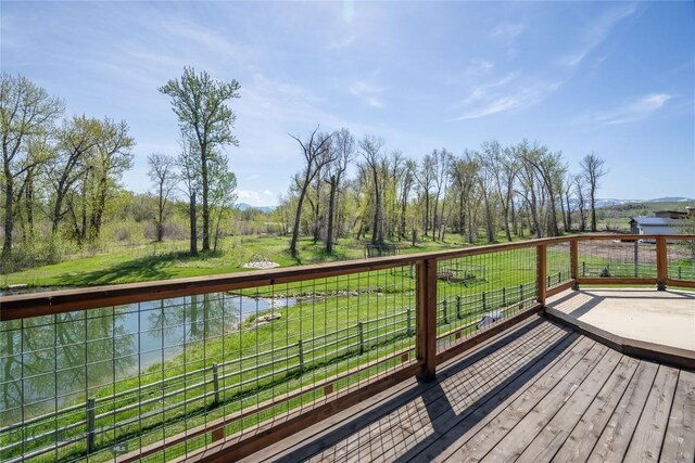 9704 River Rd, Bozeman, MT 59718 - deck with a yard