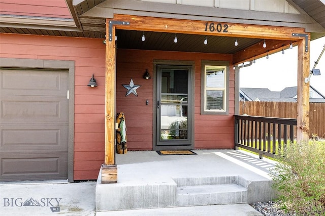 1602 Ingomar Blvd, Belgrade, MT 59714 - view of exterior entry with covered porch and fence