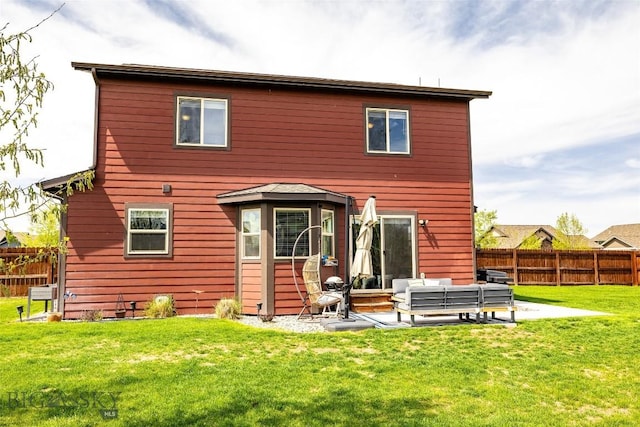 1602 Ingomar Blvd, Belgrade, MT 59714 - rear view of property featuring an outdoor living space and a patio area