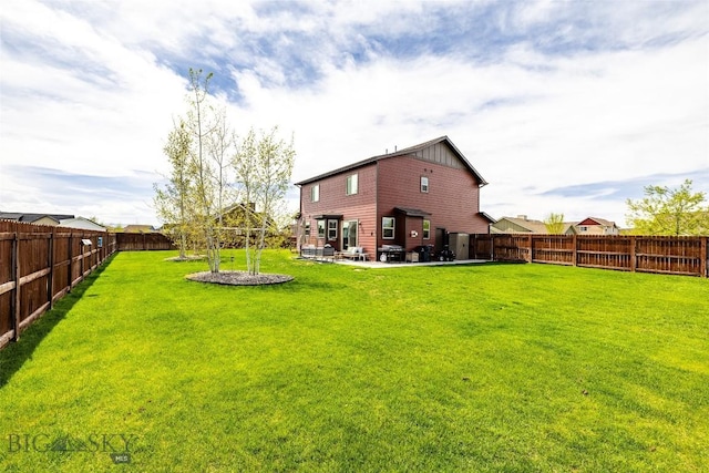 1602 Ingomar Blvd, Belgrade, MT 59714 - rear view of property with board and batten siding and a patio area
