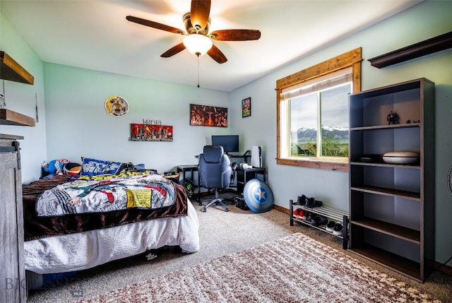 1602 Ingomar Blvd, Belgrade, MT 59714 - carpeted bedroom with a ceiling fan and a desk
